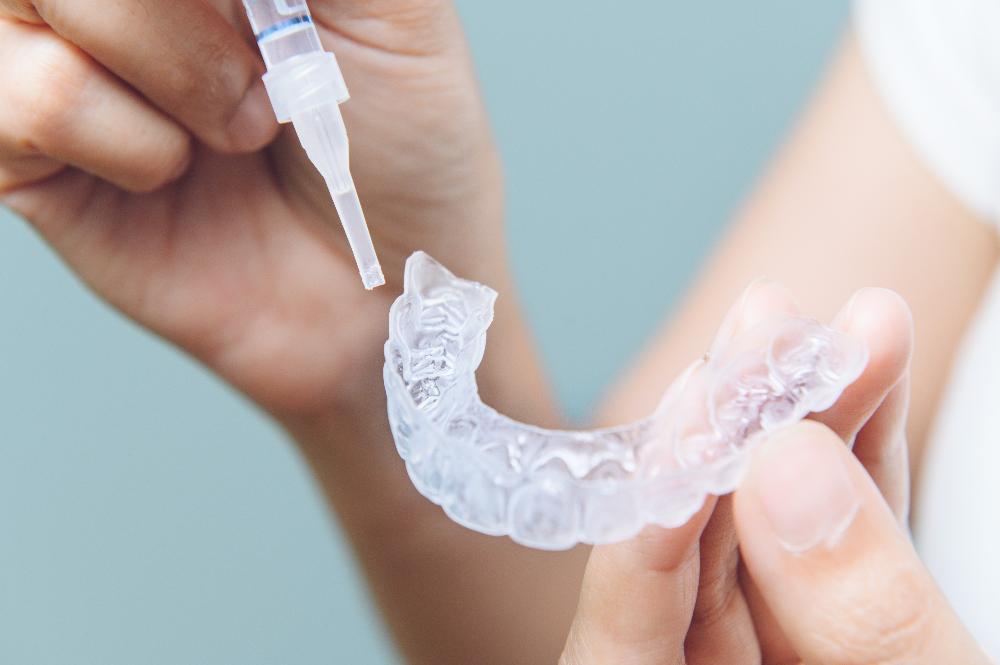 close up of clear plastic aligner | teeth whitening goffstown nh