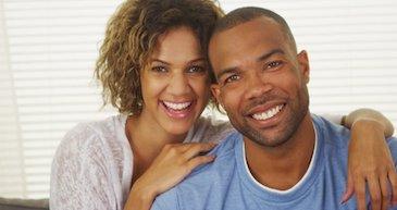 young couple hugging | goffstown dentist