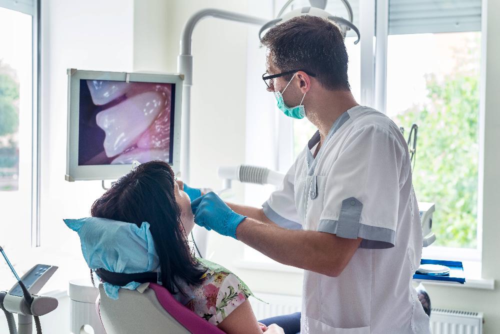dentist showing x-ray | general dentist goffstown nh