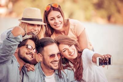 group of five taking a selfie | cosmetic dentist bedforn nh