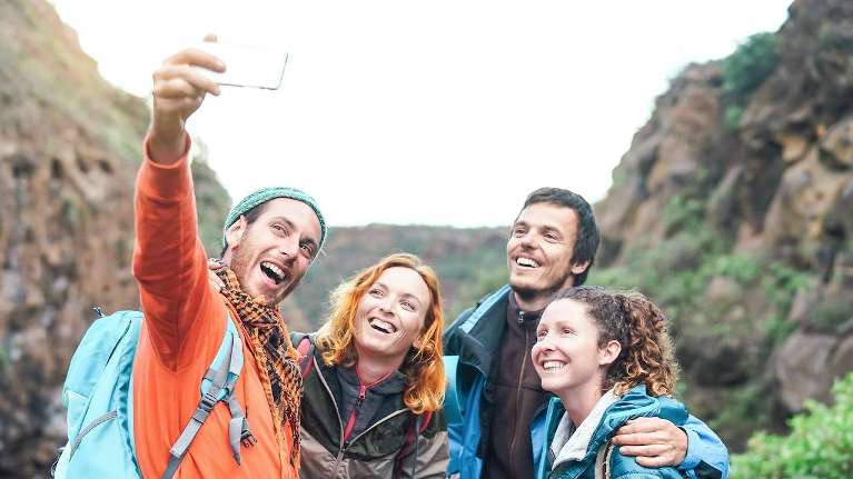 group of friends smiling | goffstown dentist