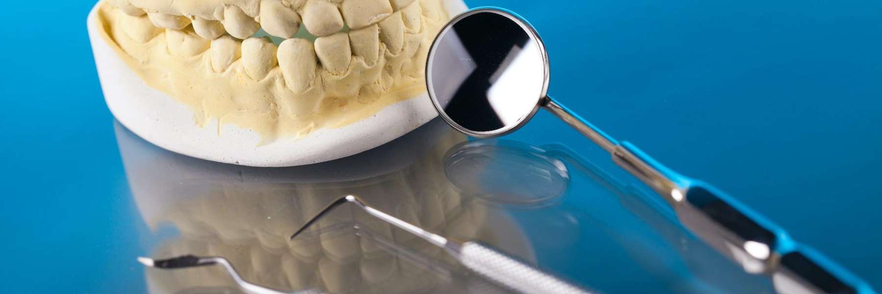 close up of mouth mold with dental tool | goffstown dentist