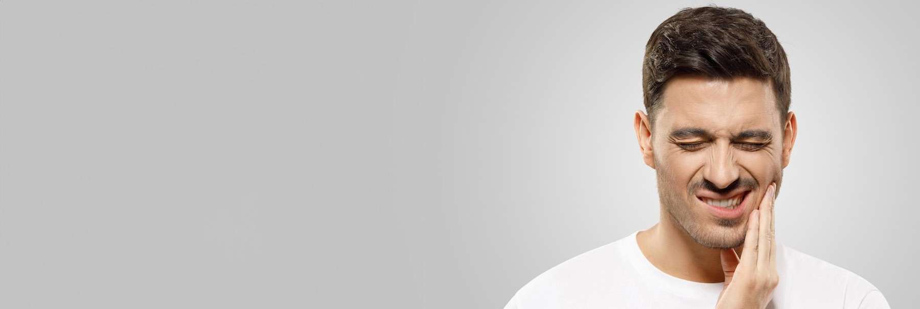 man with toothpain | goffstown nh dentist